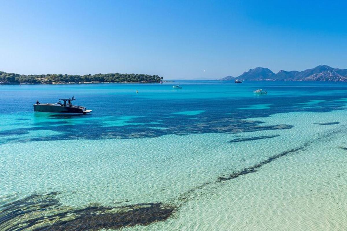 a boat in the water near a beach