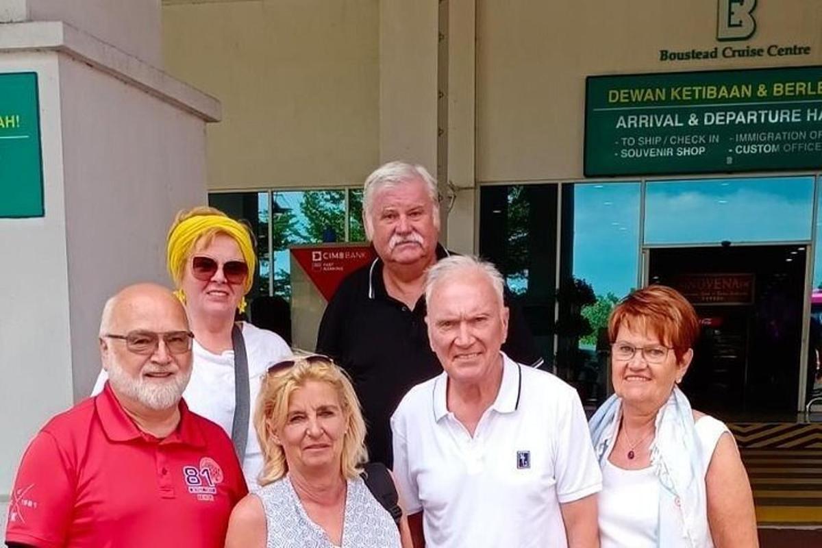 a group of people standing in front of a building