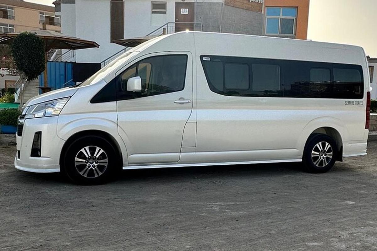 a white van parked in a parking lot