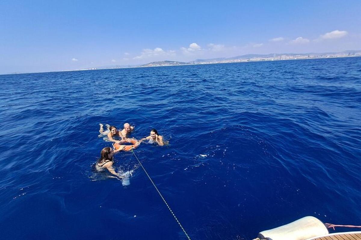a group of people in the water in the ocean