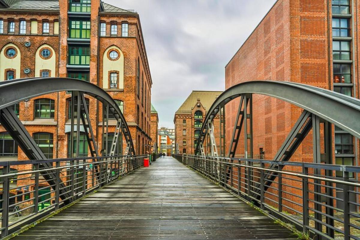 a bridge in the middle of a city with buildings