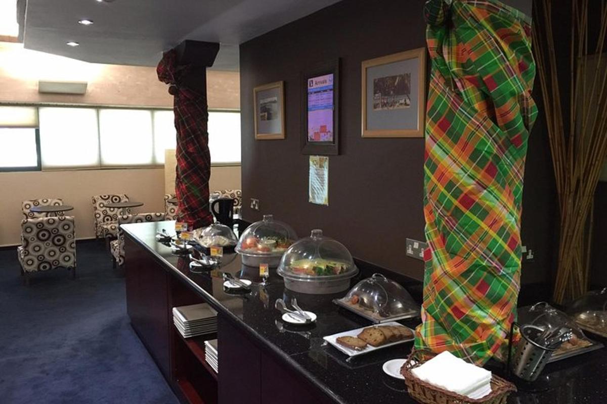 a room with a buffet of food on a counter