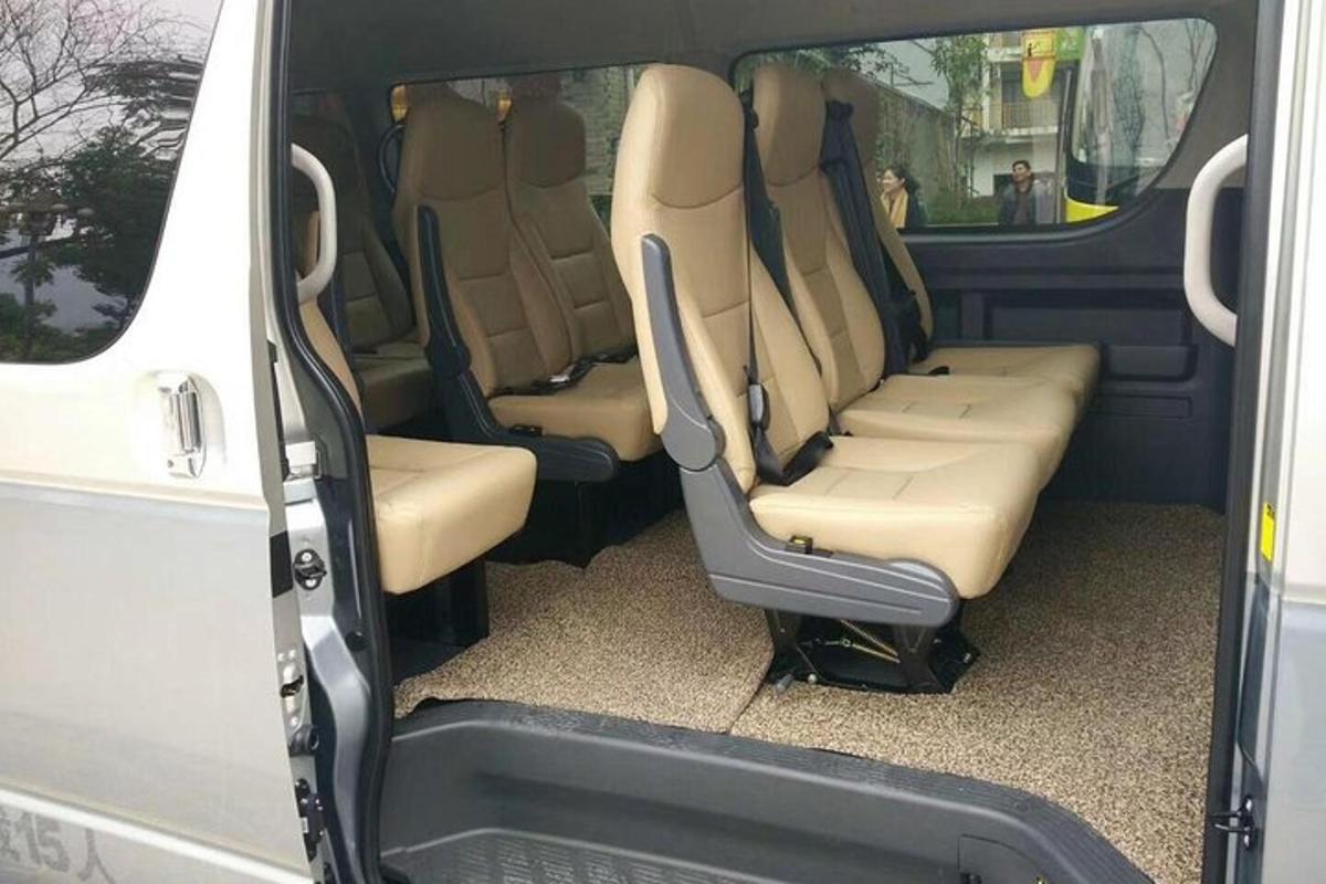 a back seat of a van with the doors open
