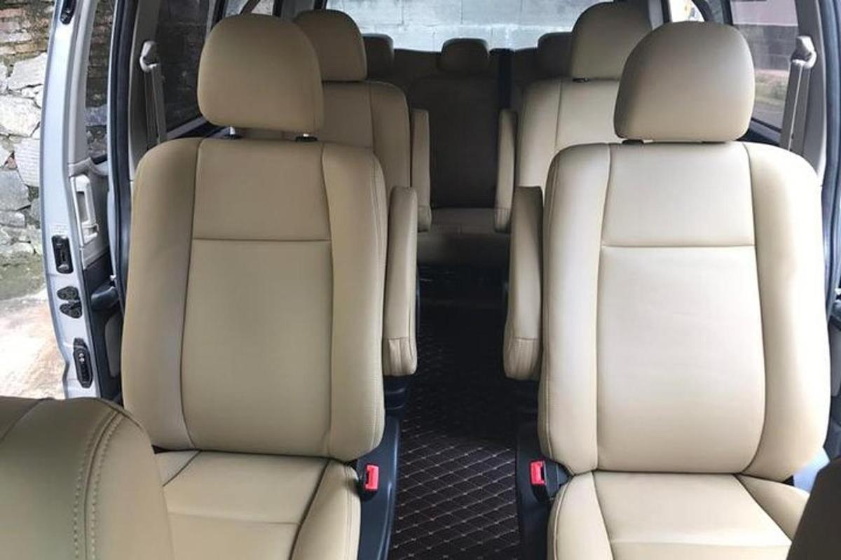 two empty seats in the back of a van