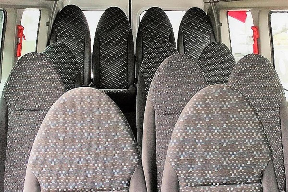 a row of empty seats in a bus