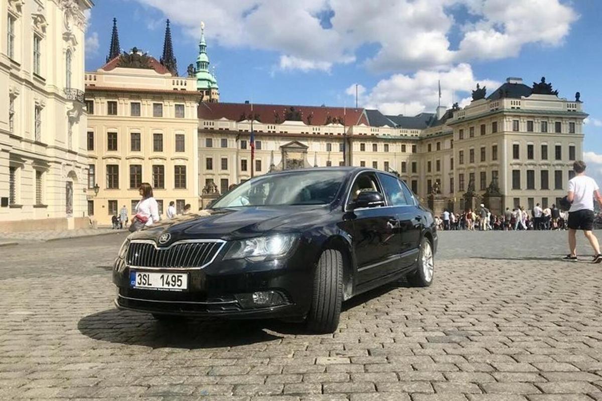 a black car parked in front of a building