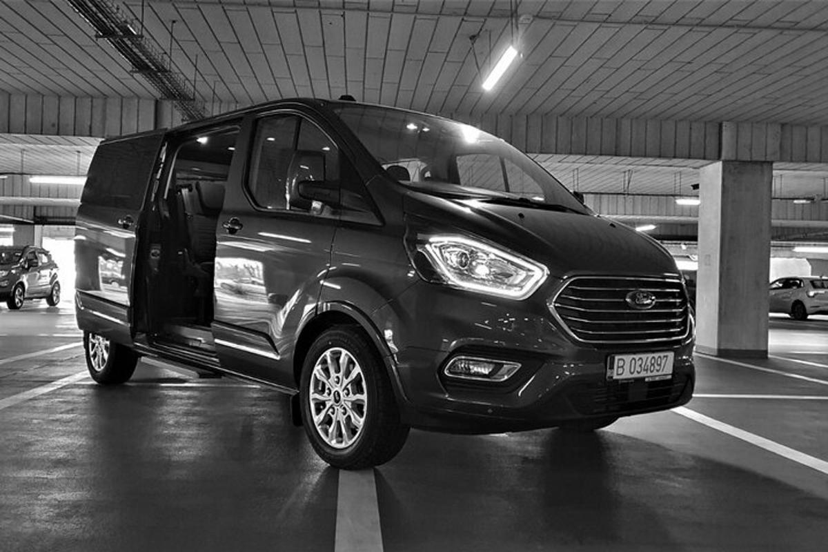 a black van parked in a parking lot