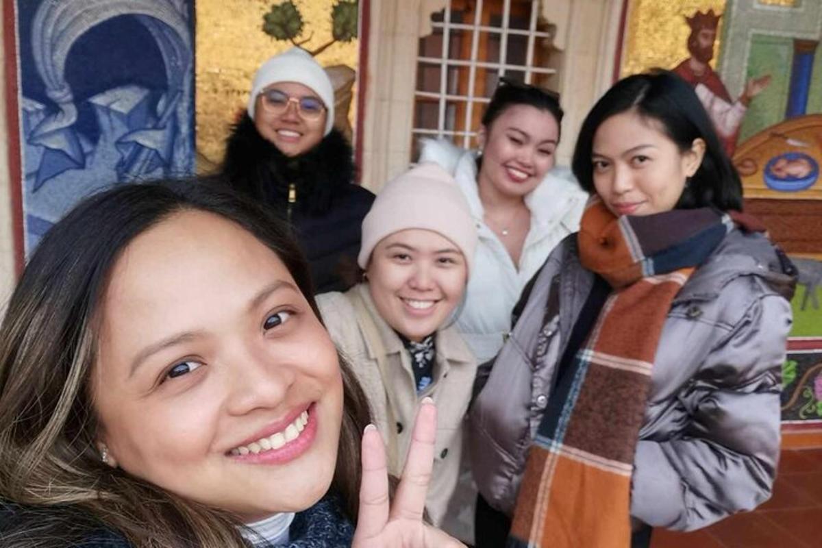 a group of women posing for a picture