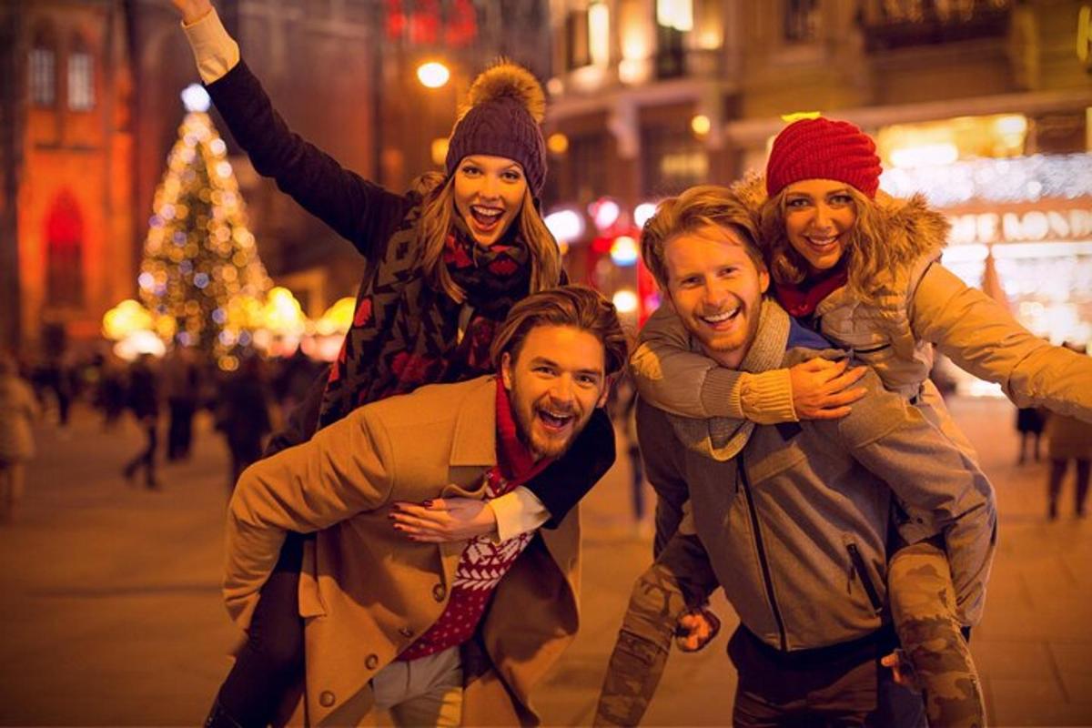 a group of people posing for a picture on a city street