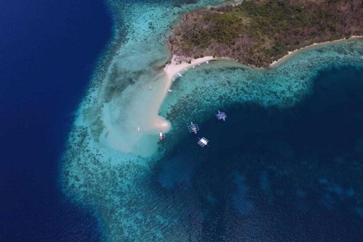 an aerial view of an island in the ocean