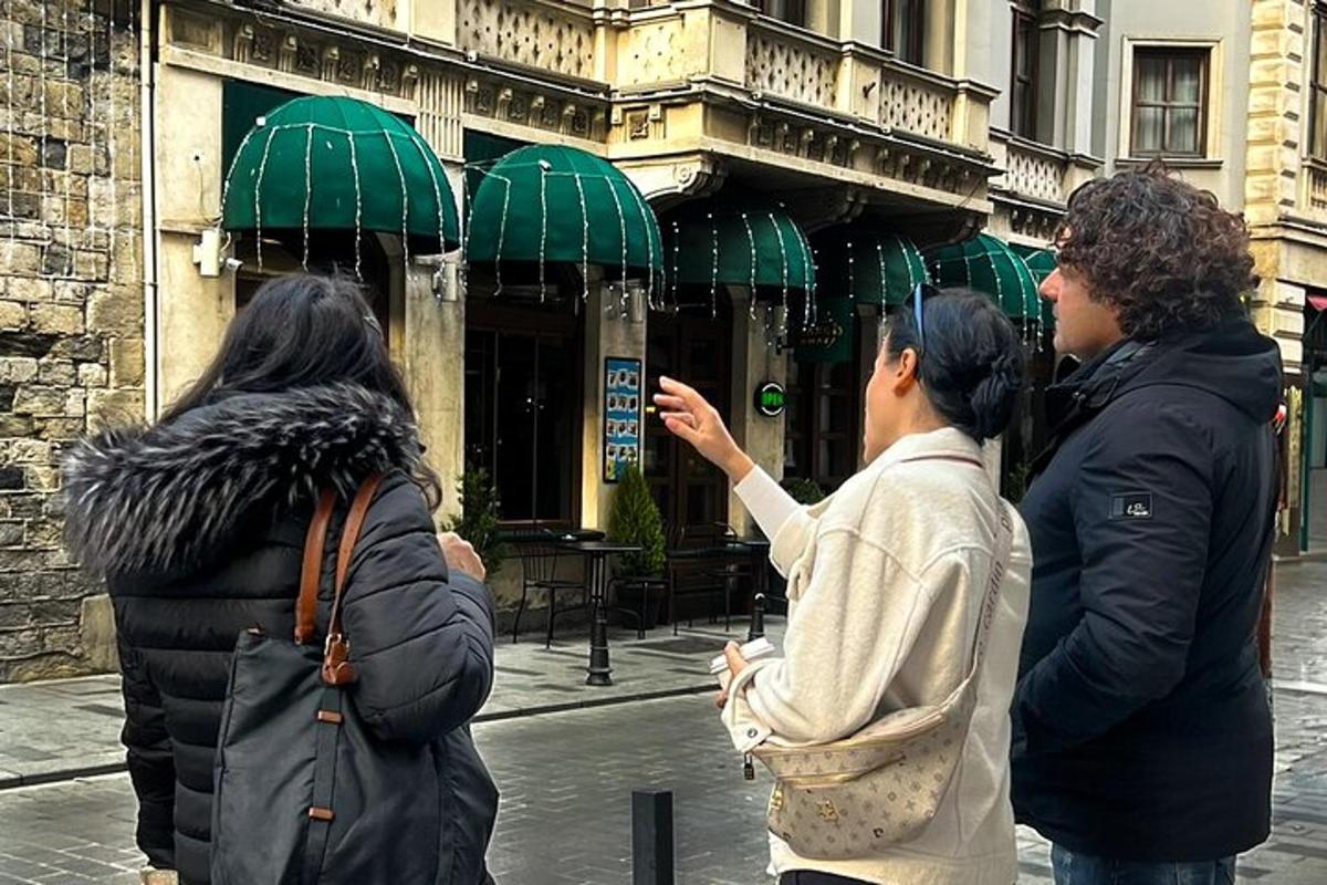 a group of people standing outside of a building