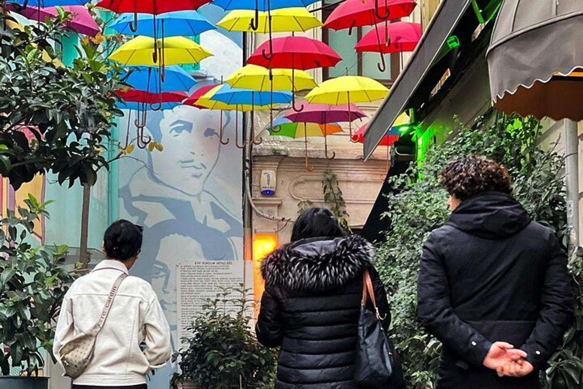 a group of people walking down a street with umbrellas