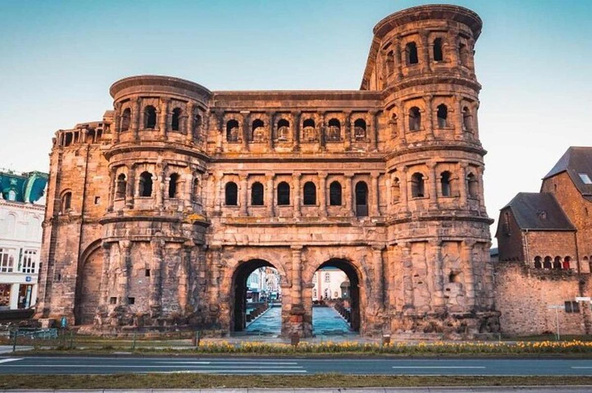 a large stone building with an arch way