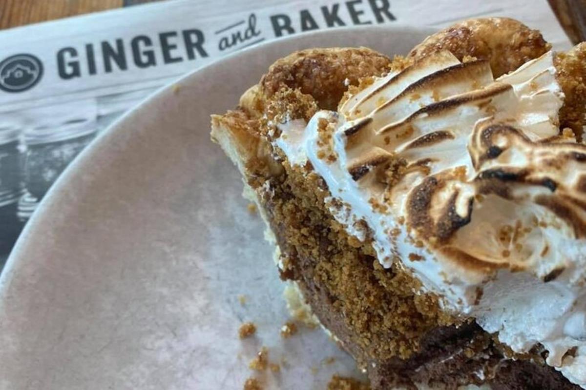 a piece of pie on a white plate