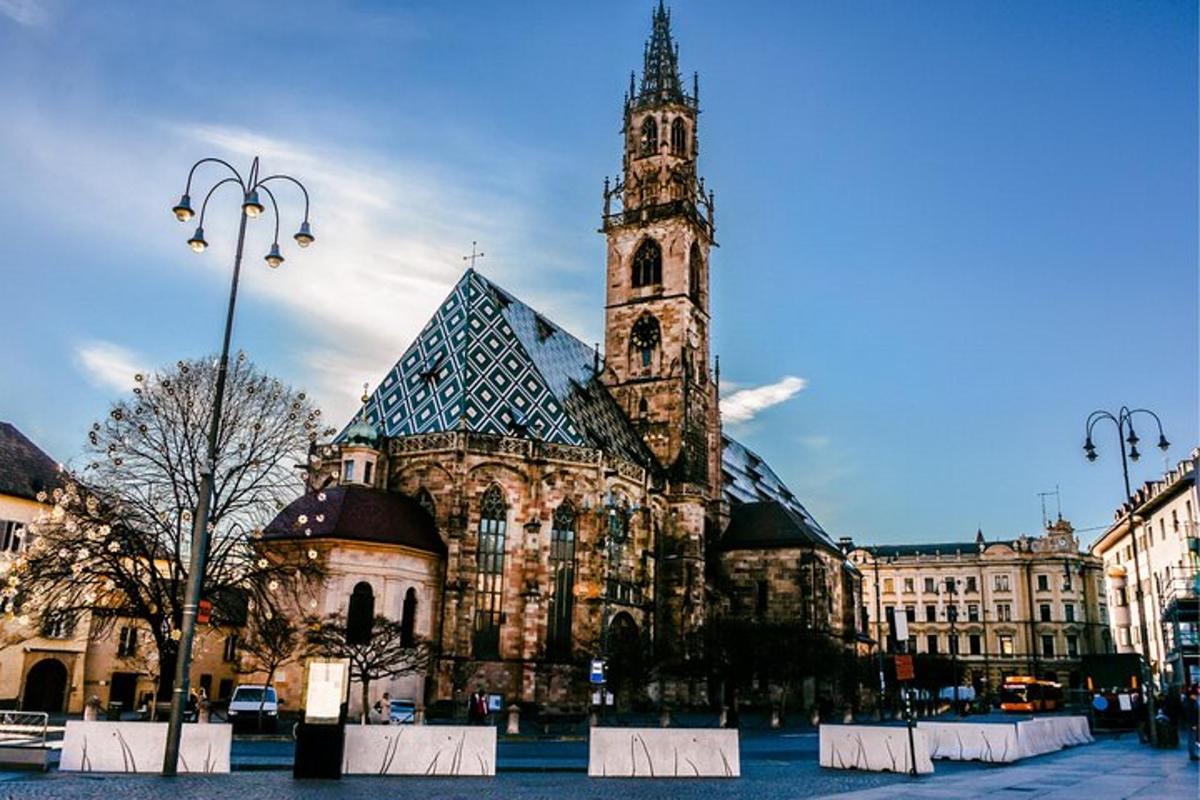 a large building with a clock tower in a city
