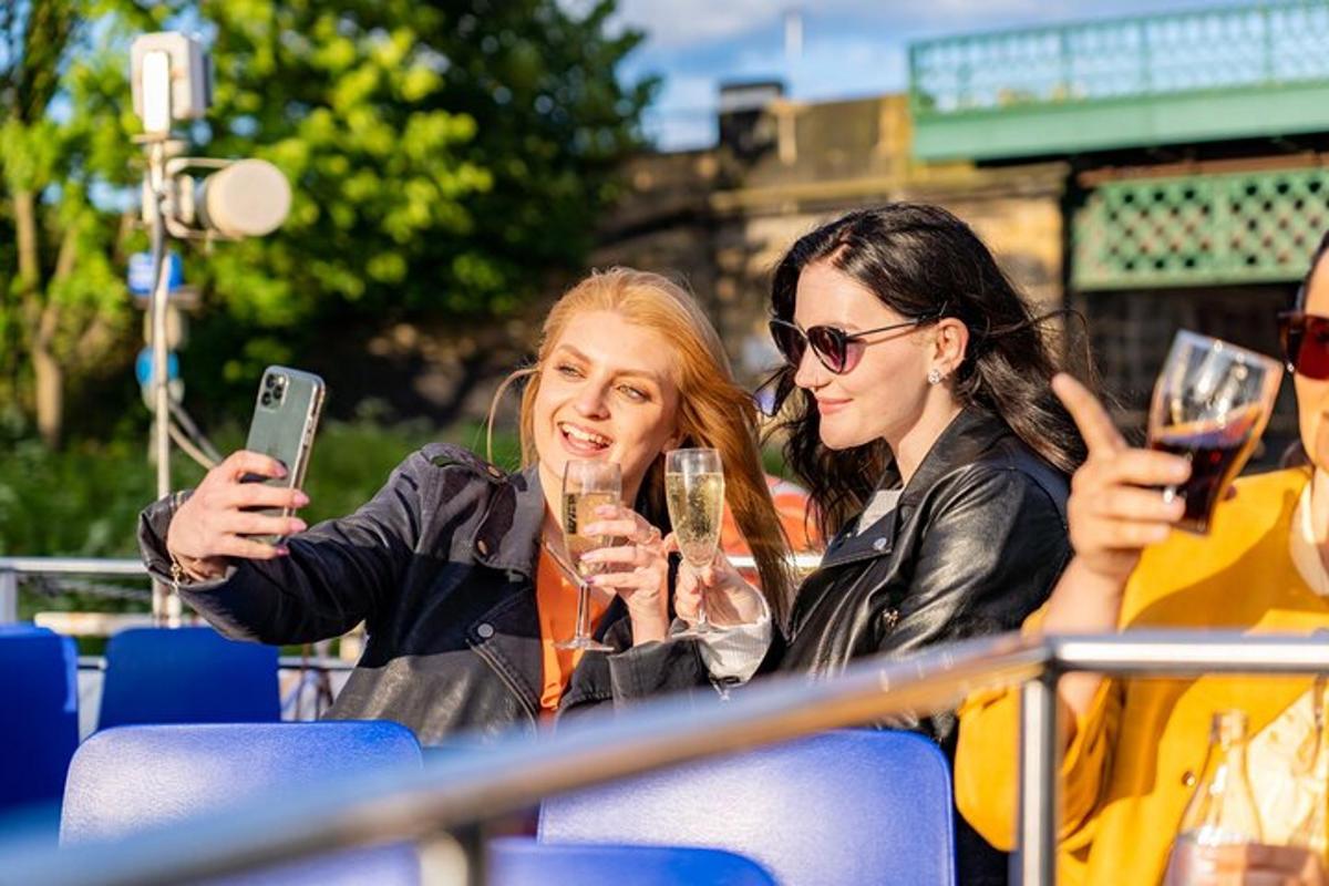 two women holding up their glasses of wine
