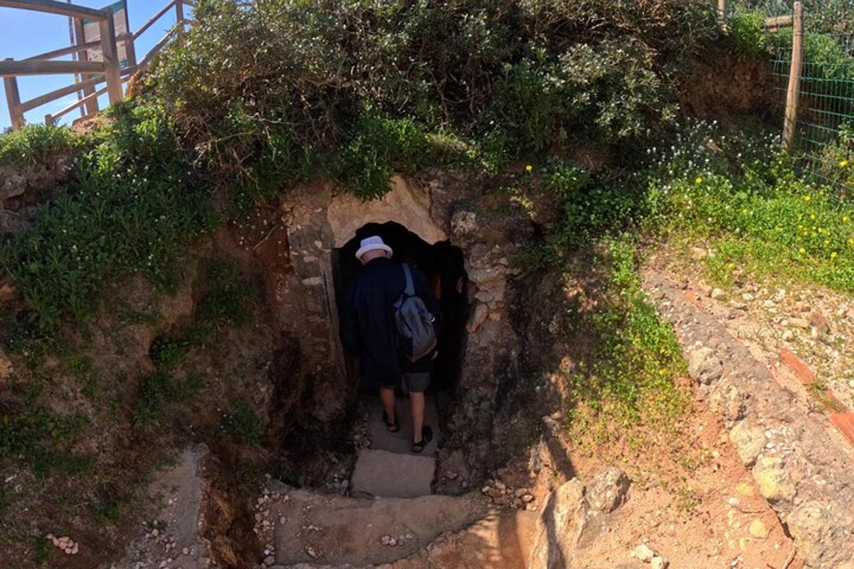 a person walking down a path with a backpack