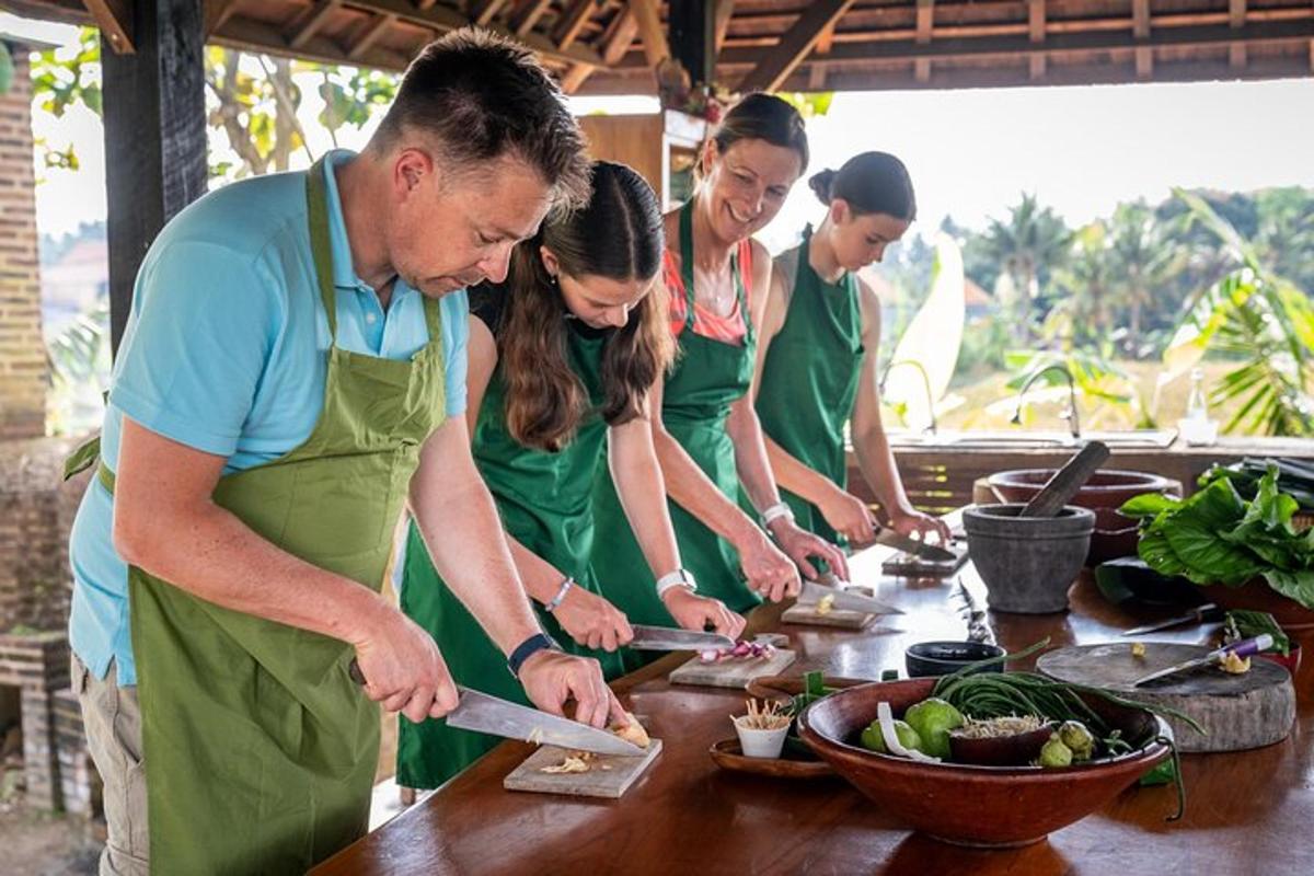 a group of people in a kitchen preparing food