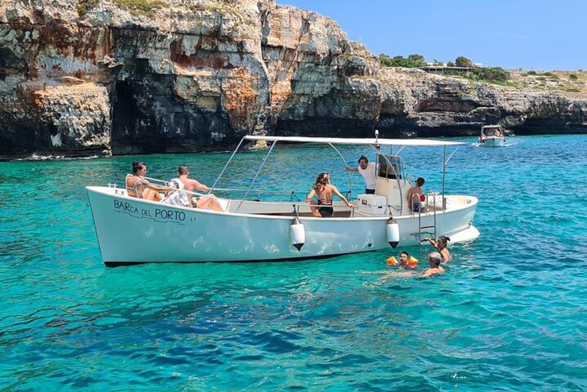 a group of people on a boat in the water