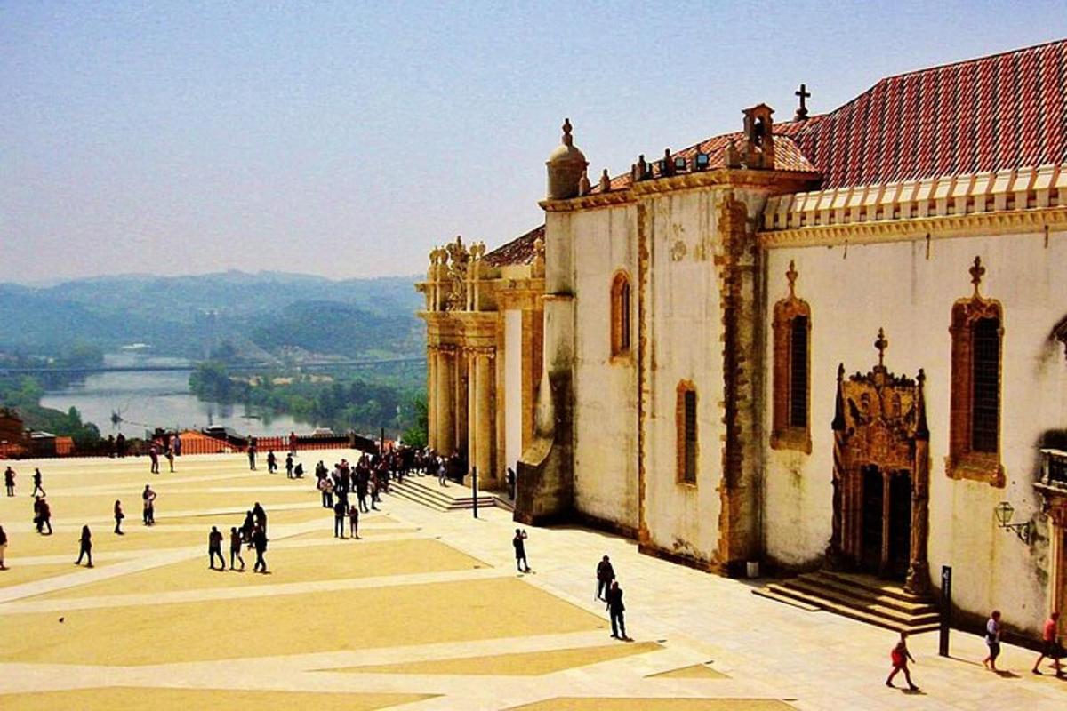 a group of people walking in front of a building