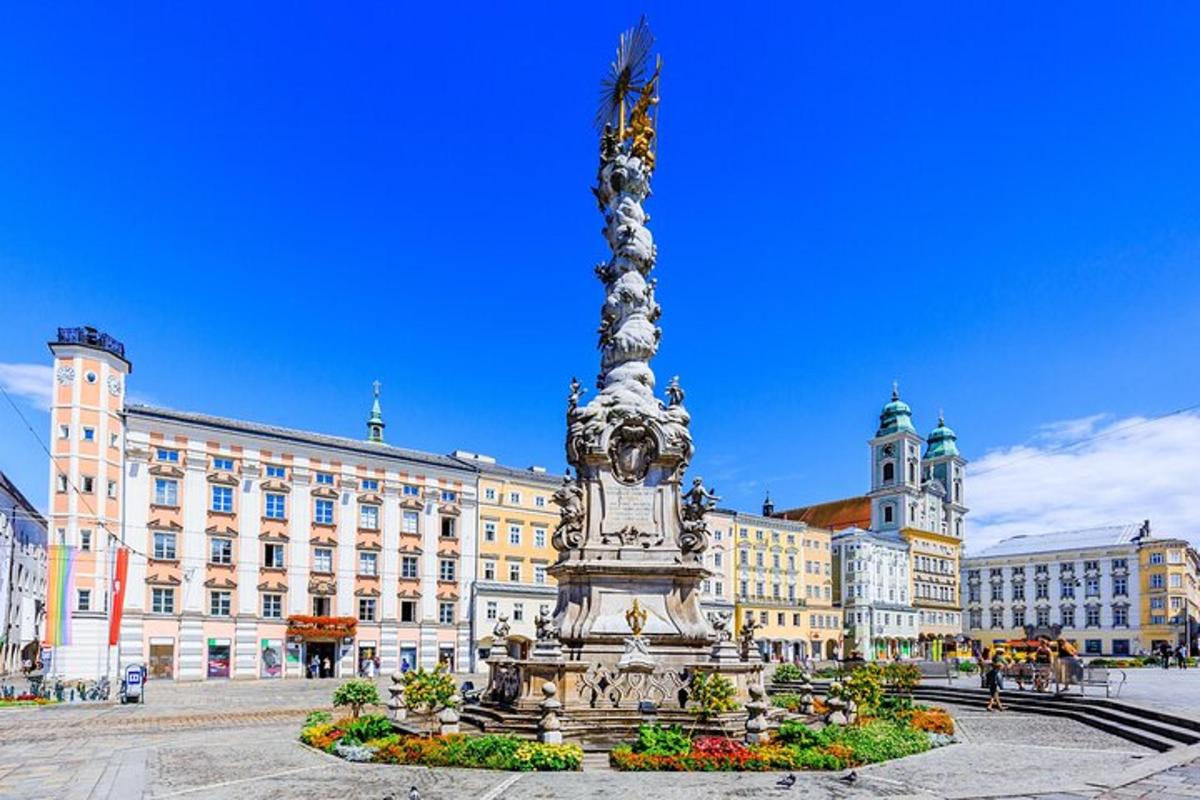 a statue in front of a large building