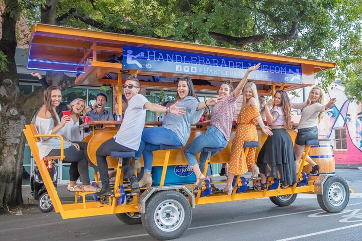 a group of people riding on a yellow cart