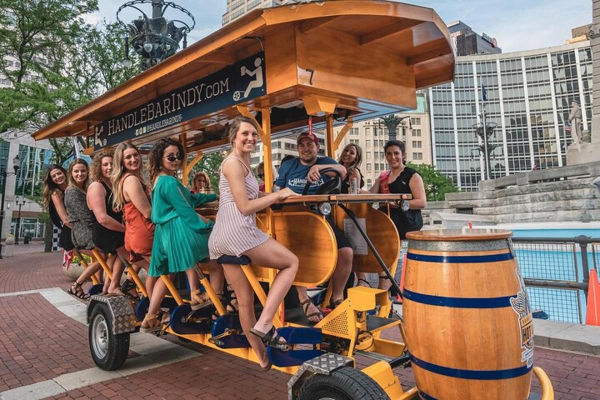 a group of people riding on a wine tasting vehicle