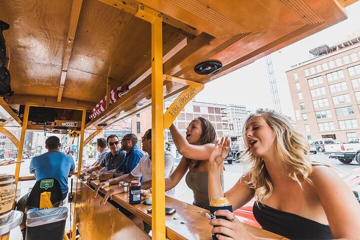 a group of people sitting at a table on a bus