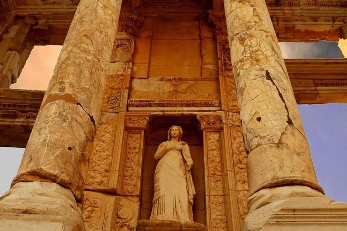 a statue of a woman in the middle of a building