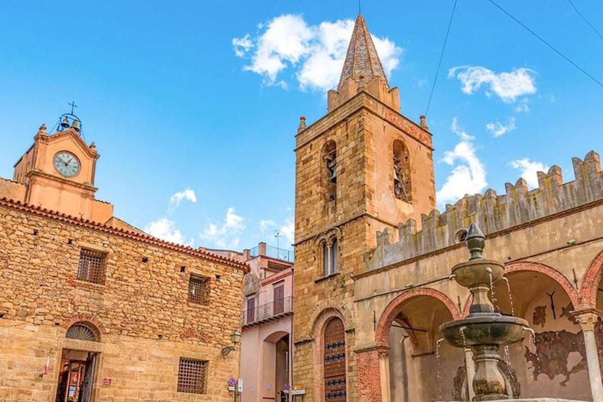 an old building with a clock tower and a church