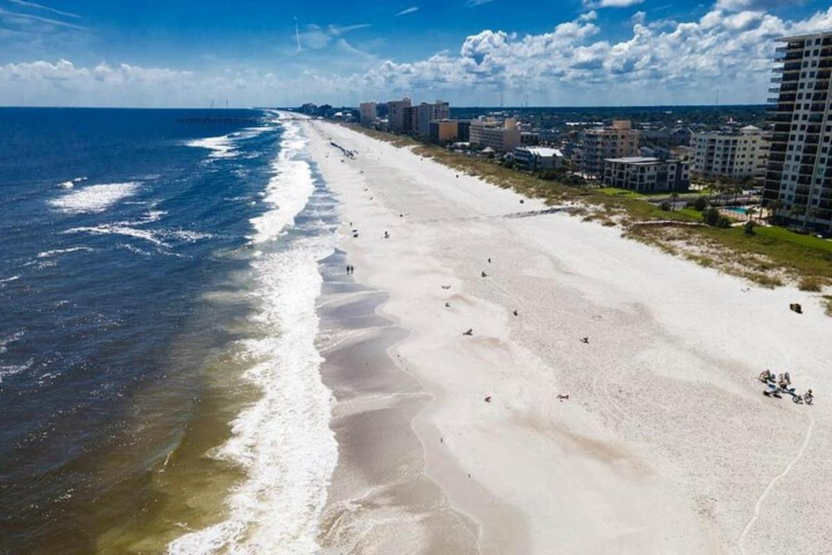 an overhead view of a beach with people on it