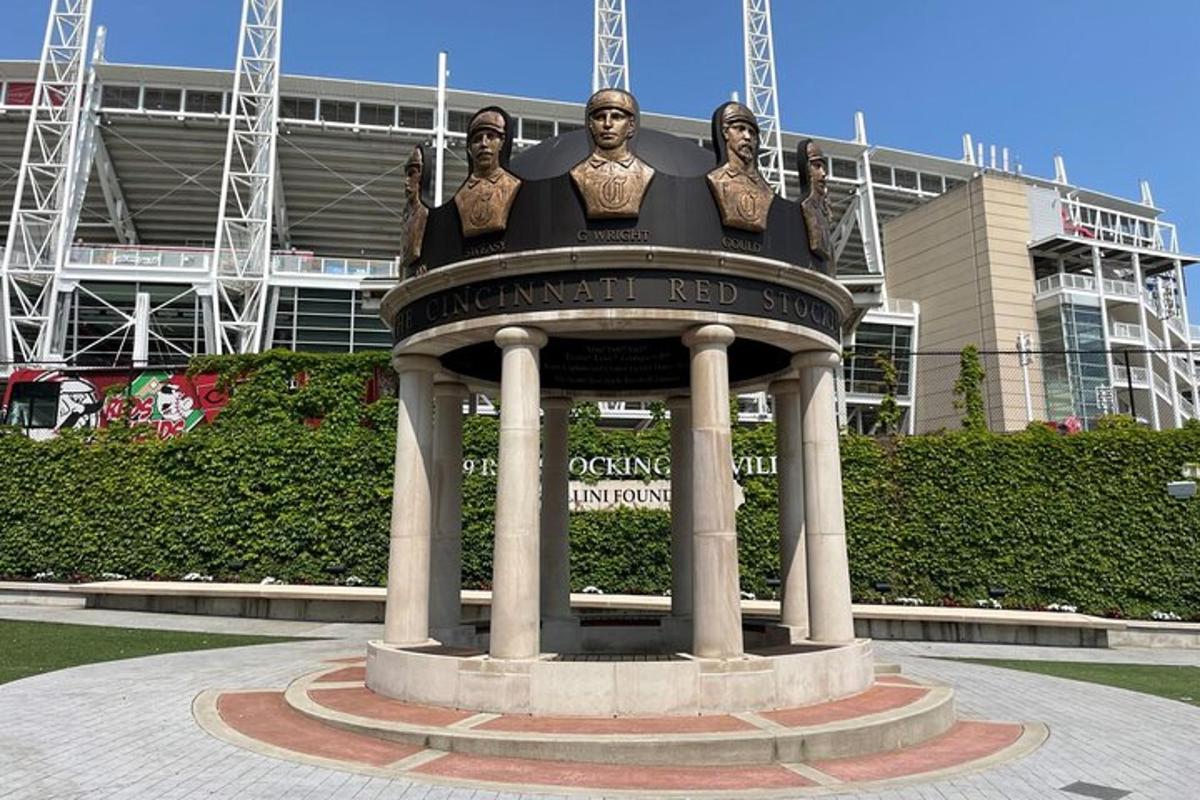 a statue in front of a football stadium