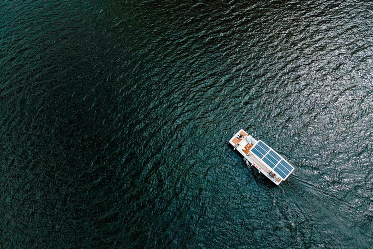 an aerial view of a boat in the water