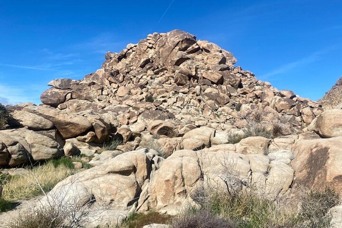 a pile of rocks on top of a mountain