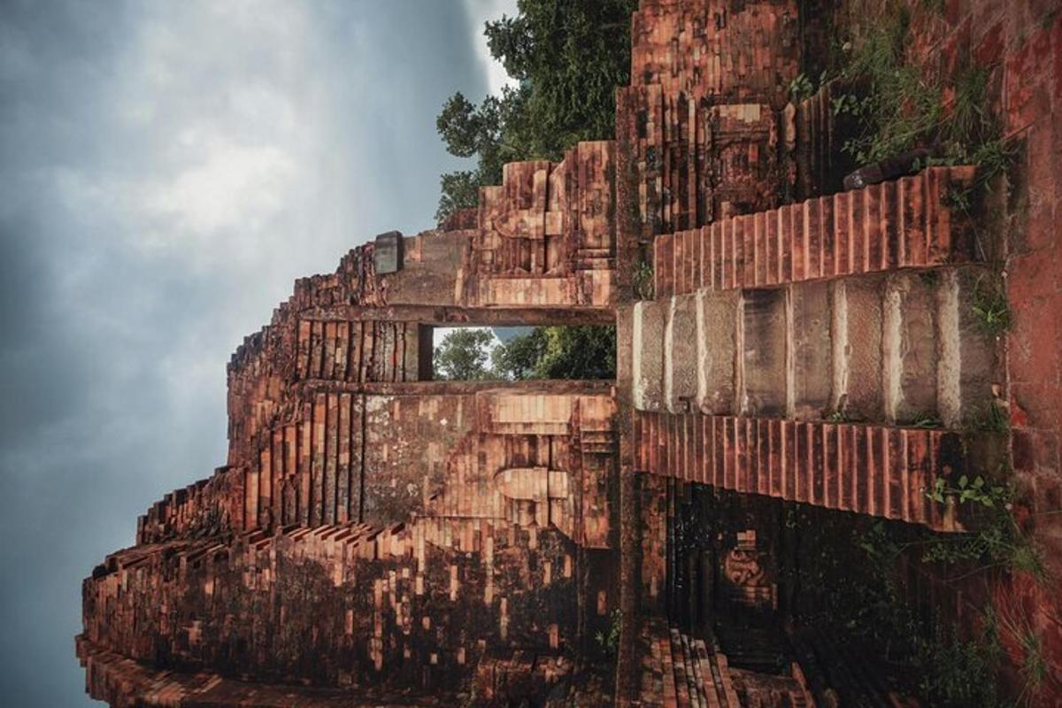 an ancient building with a window on the side of it