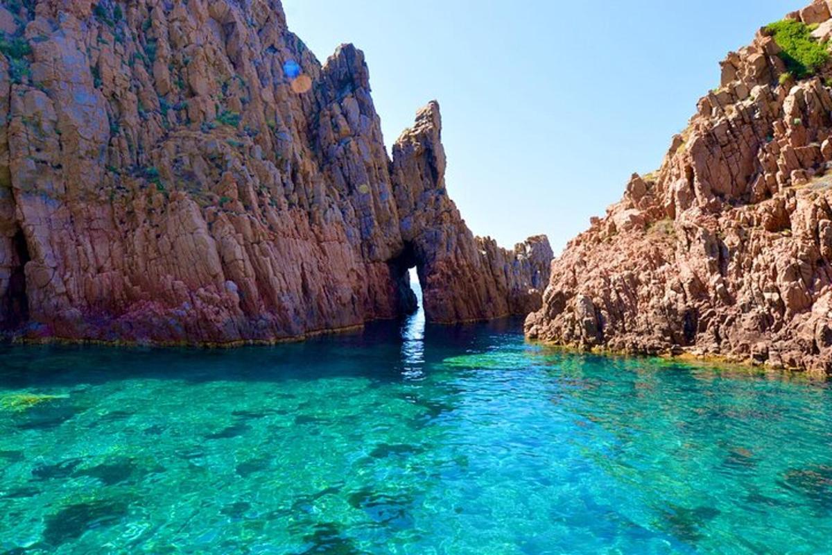 a body of water between two rocky cliffs