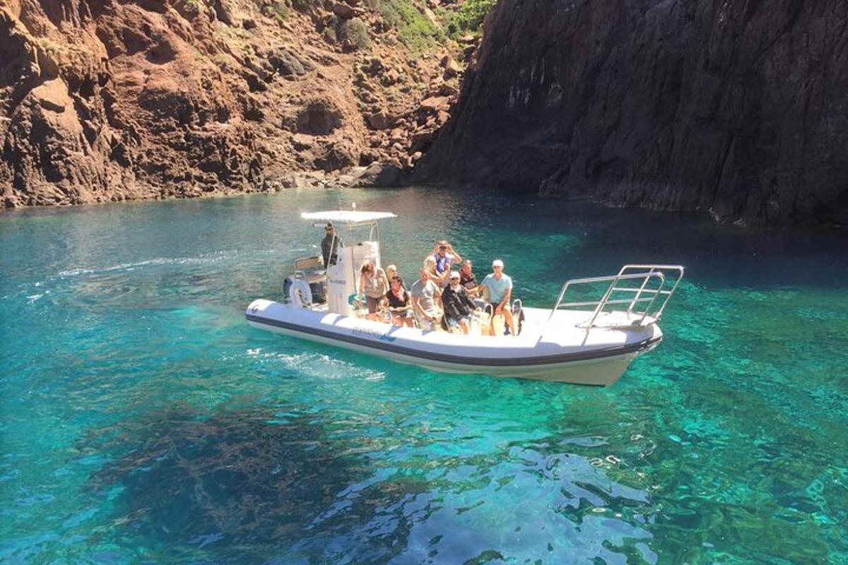 a group of people on a boat in the water