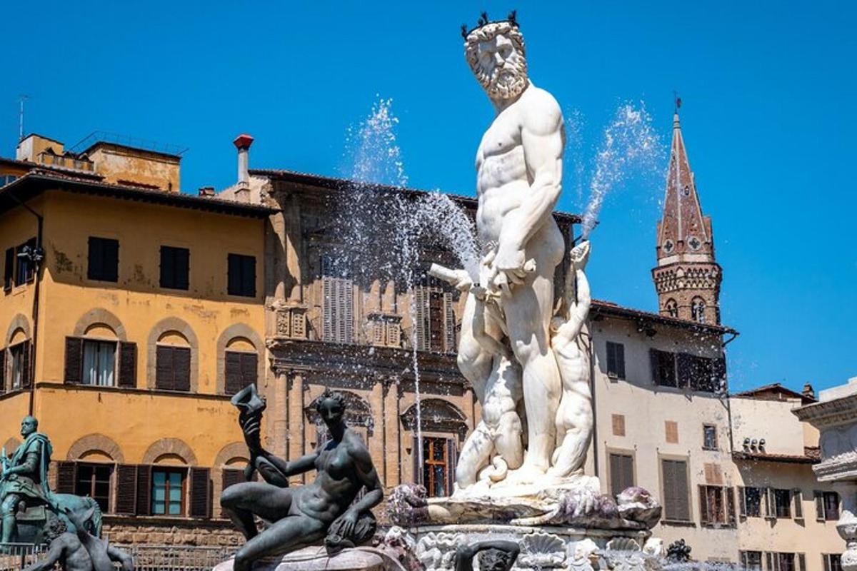 una font davant d'un edifici amb una estàtua