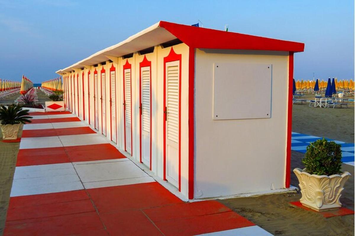 a row of beach huts on the beach