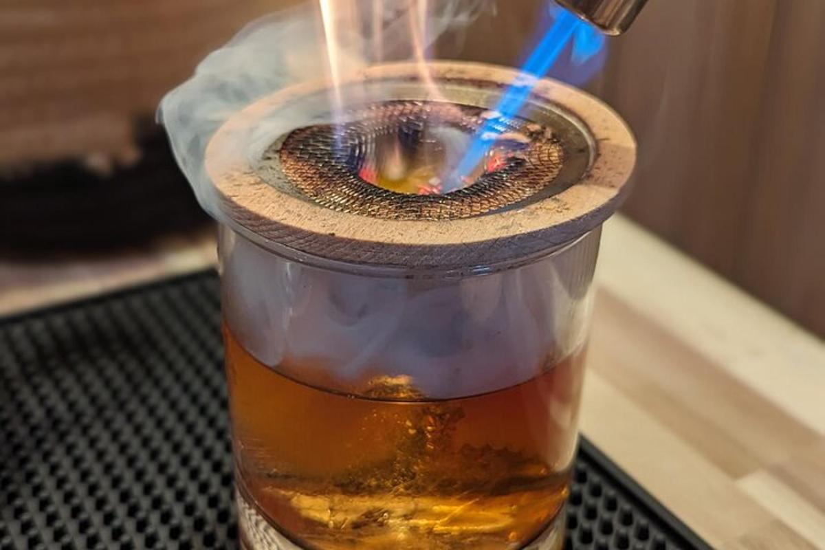 a drink in a cup on a table