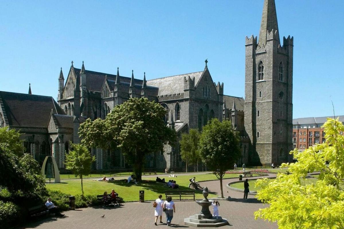 a large building with a church with a tower