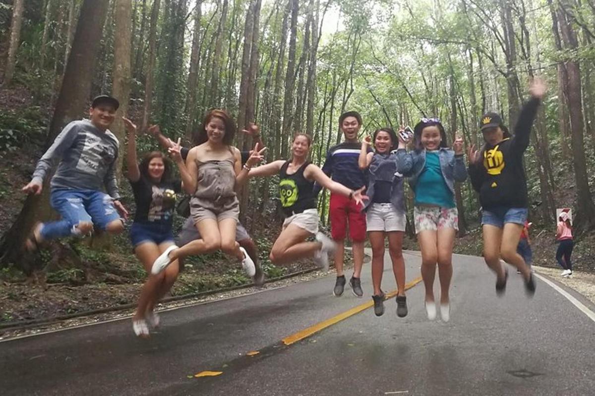 a group of people running down a road
