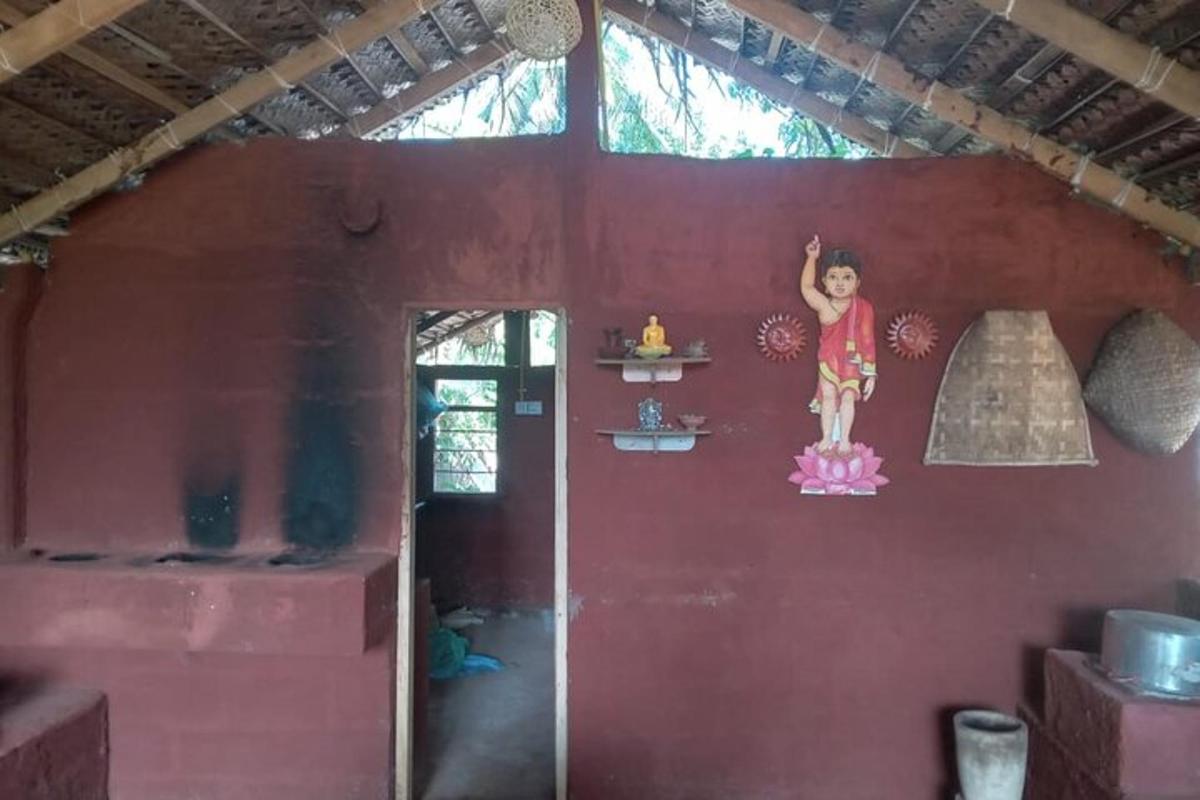 a wall with a painting of a little girl on it
