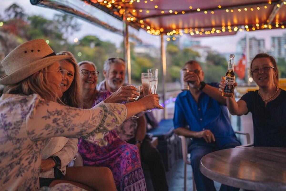 a group of people holding up glasses of wine