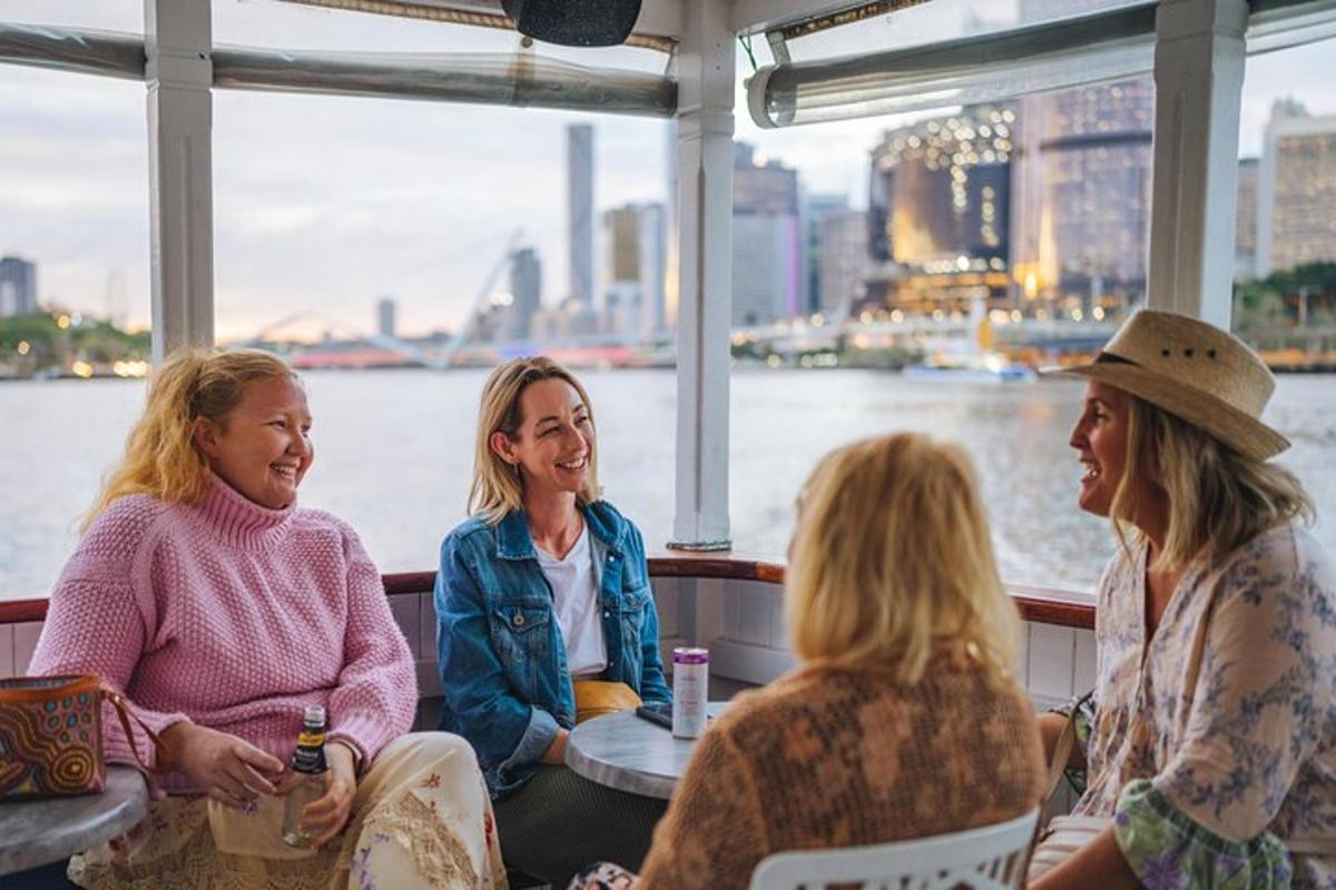a group of people sitting on a boat