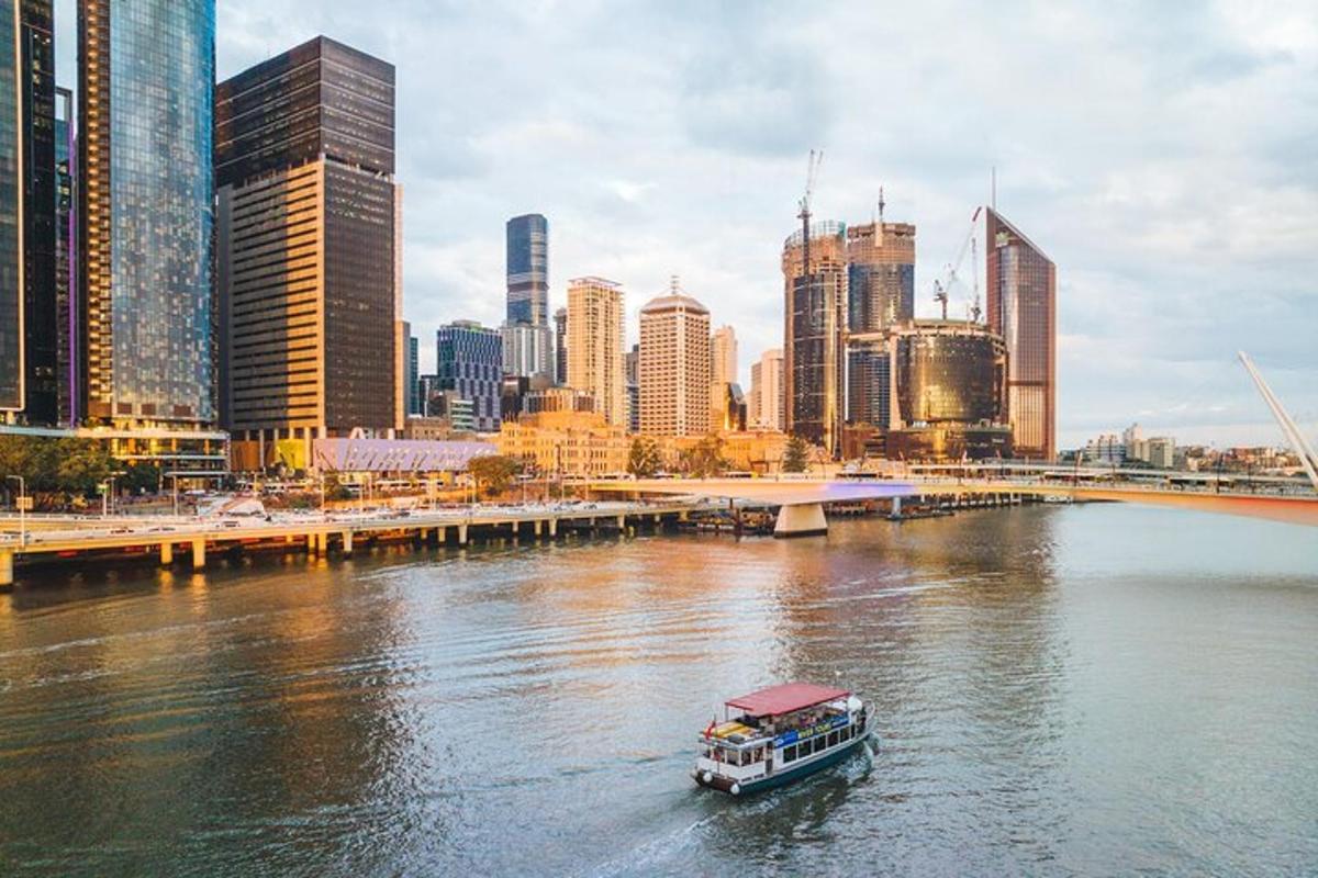 a boat on a river in a city
