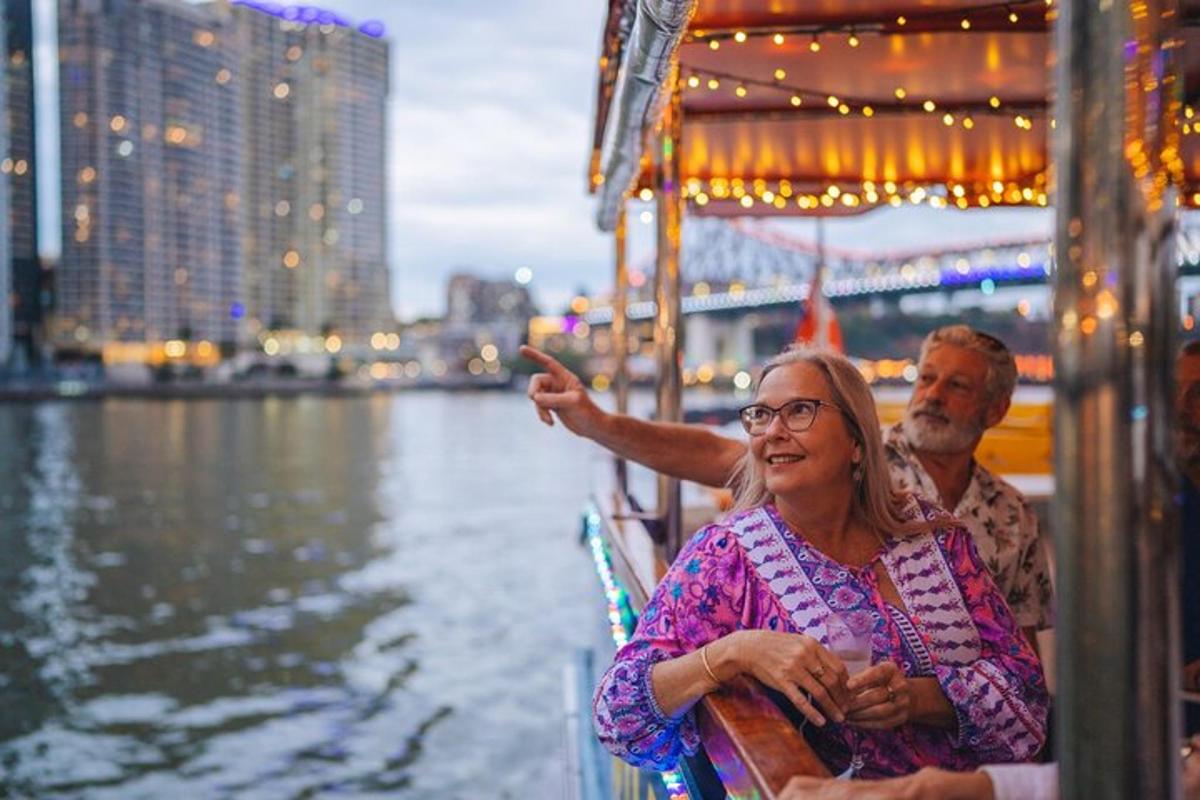a man and a woman on a boat in the water