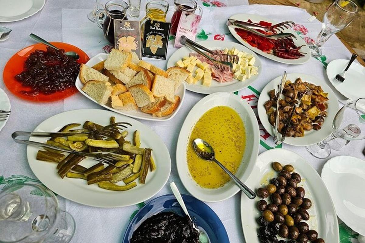 a table with many plates of food on it