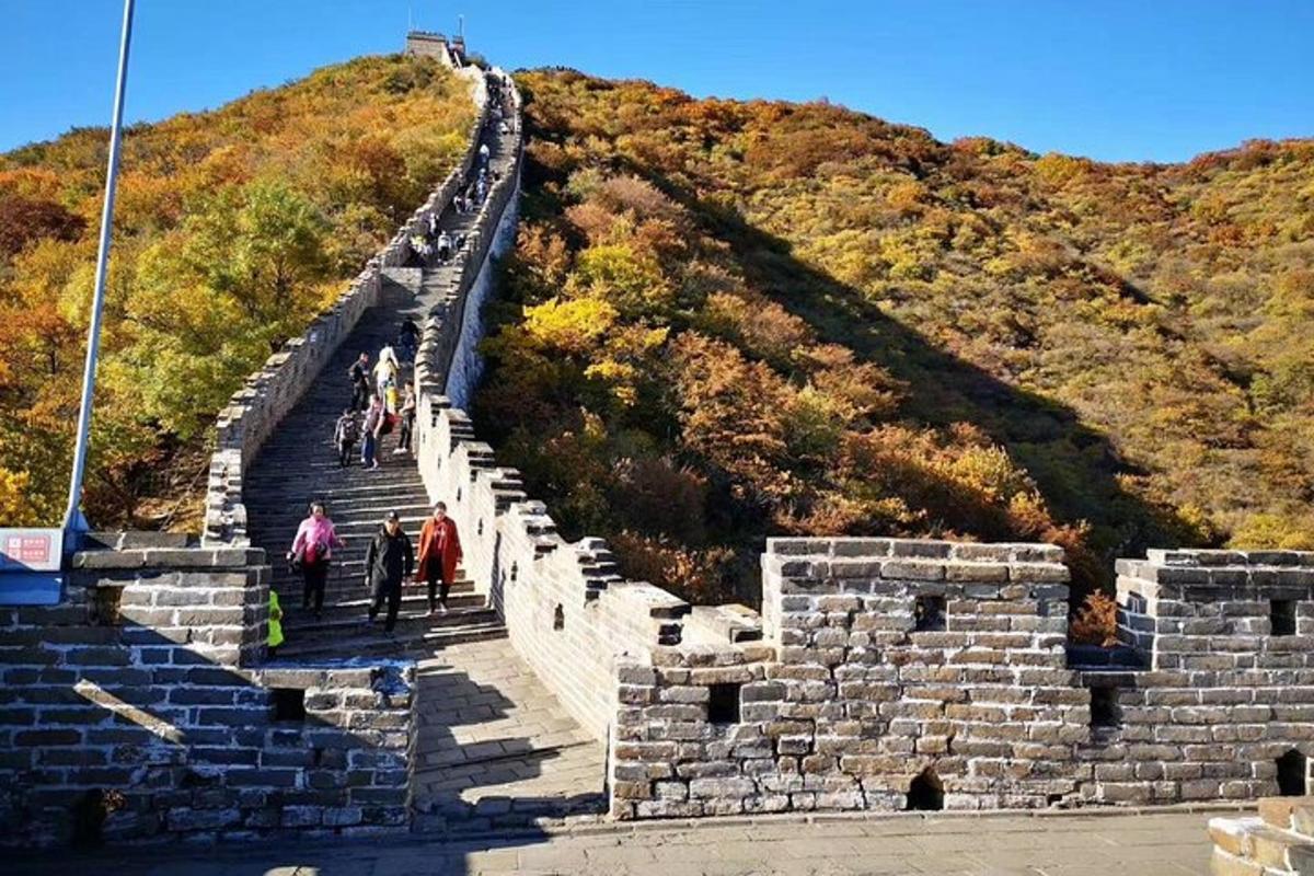 a group of people walking on the great wall