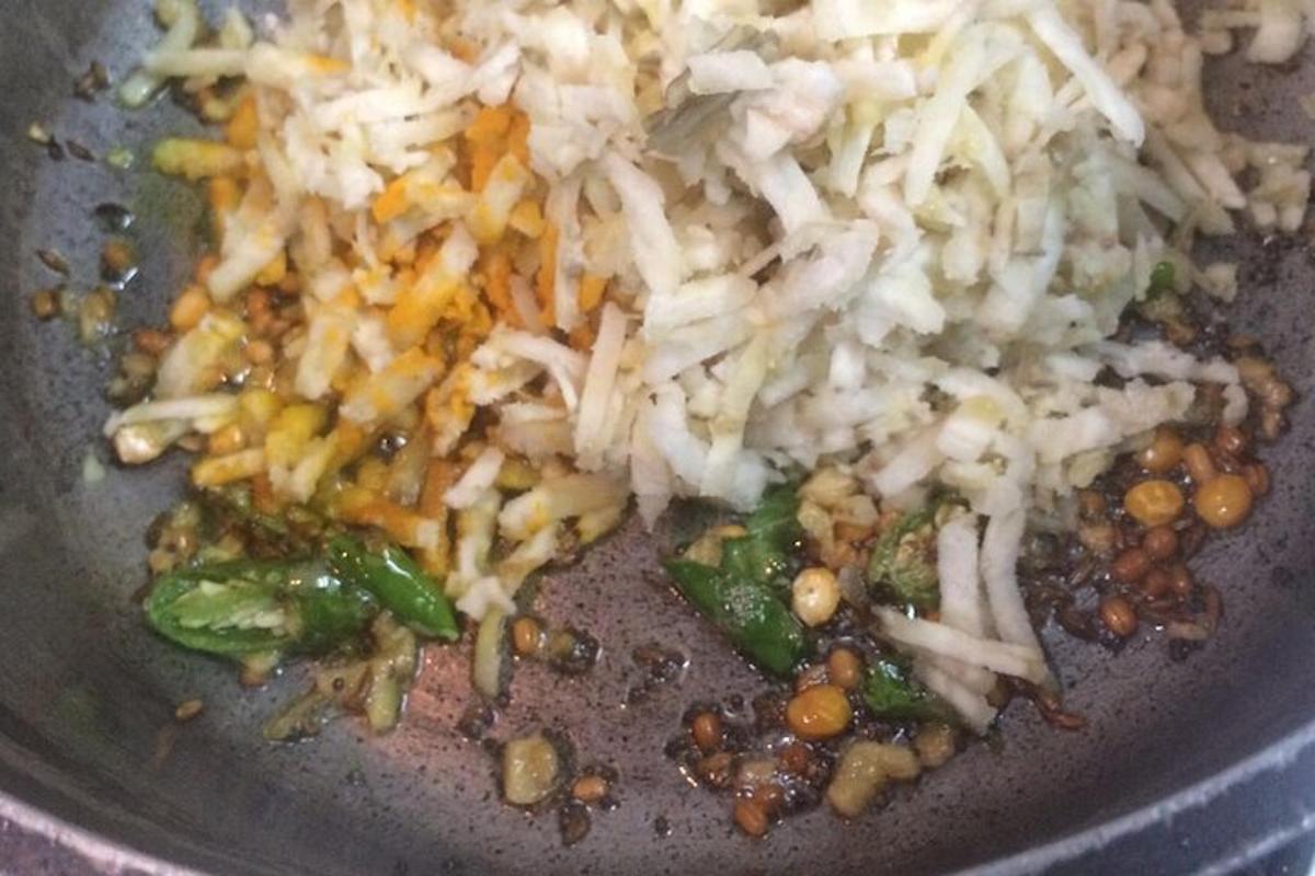 a plate of food with rice and vegetables